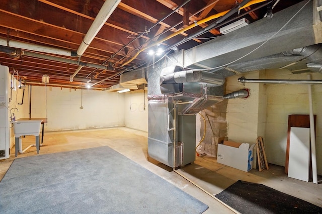 1244 N Broad St, Lancaster, OH 43130 - unfinished below grade area with heating unit and a sink