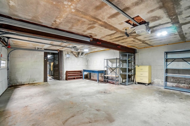 1244 N Broad St, Lancaster, OH 43130 - garage with a garage door opener and concrete block wall