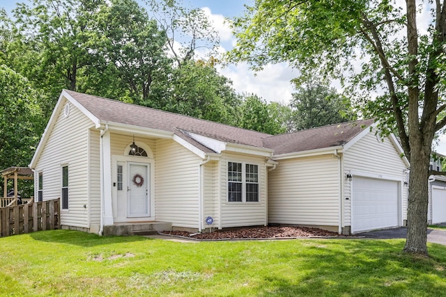 1790 Jupiter Ave, Hilliard, OH 43026 - view of front facade with a garage, asphalt driveway, and roof with shingles