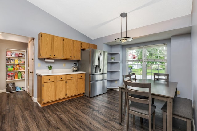 1790 Jupiter Ave, Hilliard, OH 43026 - kitchen featuring stainless steel fridge, light countertops, dark wood finished floors, lofted ceiling, and hanging light fixtures