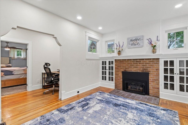 261 E Sandusky St, Mechanicsburg, OH 43044 - living area with wood finished floors, plenty of natural light, baseboards, and recessed lighting