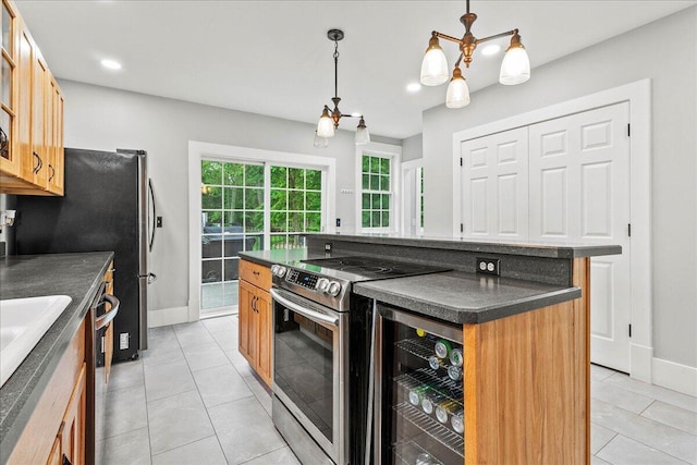 261 E Sandusky St, Mechanicsburg, OH 43044 - kitchen featuring appliances with stainless steel finishes, dark countertops, baseboards, and recessed lighting