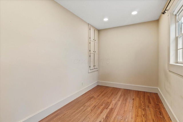 261 E Sandusky St, Mechanicsburg, OH 43044 - unfurnished room featuring light wood-style floors, baseboards, and recessed lighting
