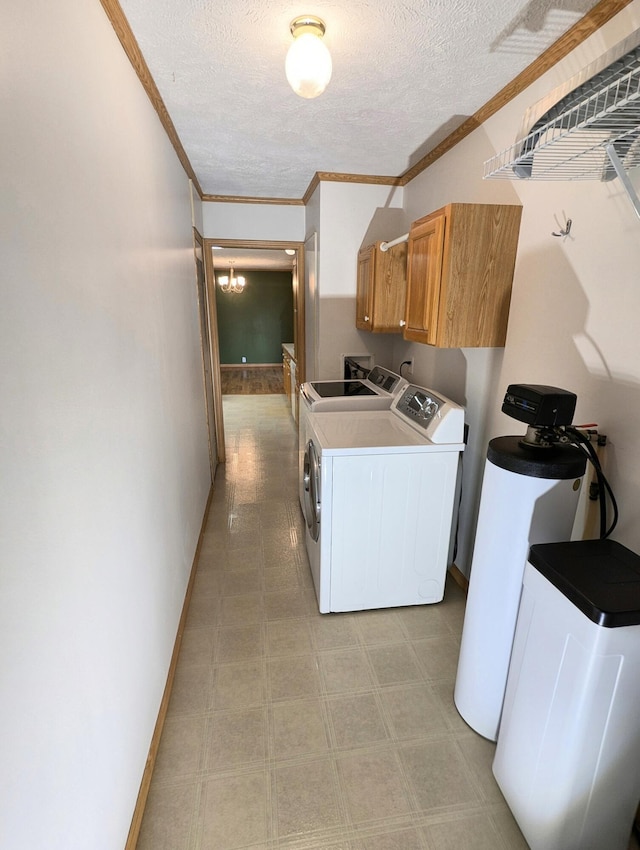 284 Camp Creek Rd, Lucasville, OH 45648 - laundry area featuring cabinet space, washer and clothes dryer, crown molding, a textured ceiling, and light floors