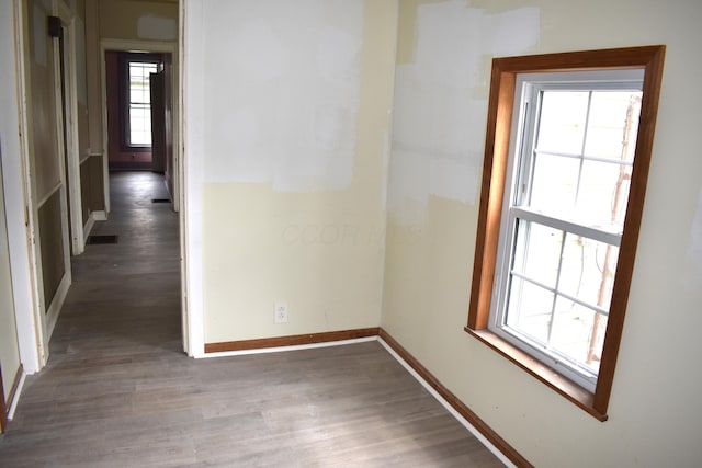 54 2nd St, Shelby, OH 44875 - hallway with wood finished floors and baseboards