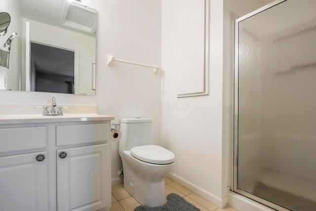5373 Cypress Chase, Columbus, OH 43228 - full bath featuring tile patterned flooring, a stall shower, vanity, toilet, and baseboards