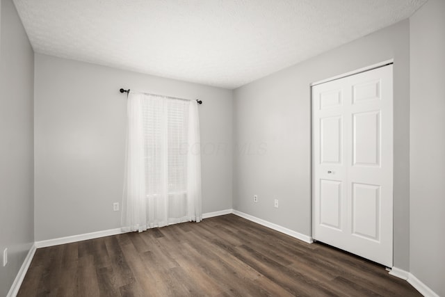 5373 Cypress Chase, Columbus, OH 43228 - unfurnished bedroom featuring dark wood-style flooring and baseboards
