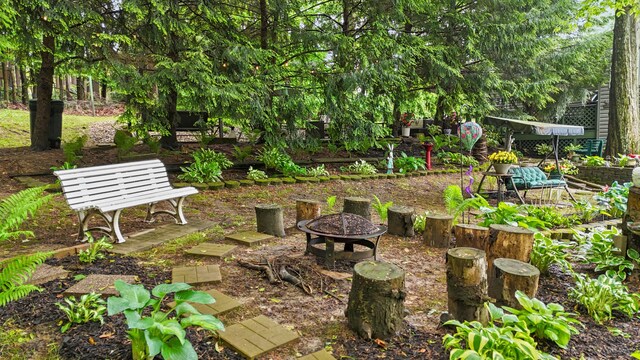 1235 Canteberry Ln, Mansfield, OH 44906 - view of patio featuring a fire pit