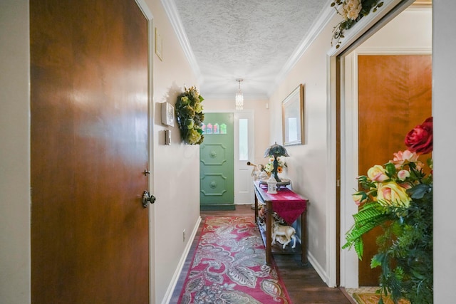 1235 Canteberry Ln, Mansfield, OH 44906 - doorway to outside featuring wood finished floors, a textured ceiling, baseboards, and ornamental molding