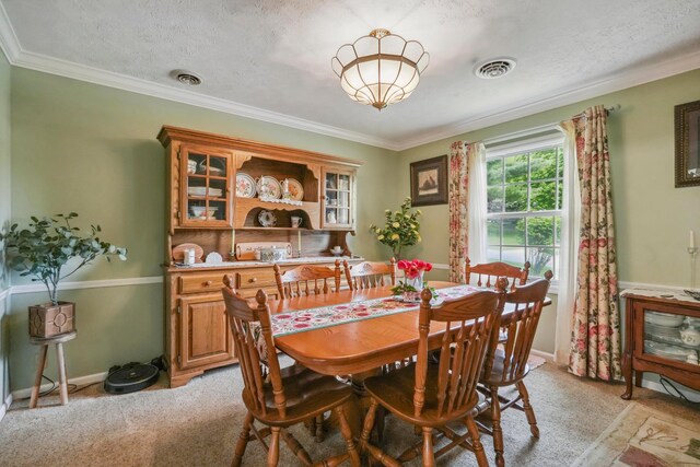1235 Canteberry Ln, Mansfield, OH 44906 - dining area with light colored carpet, ornamental molding, and baseboards