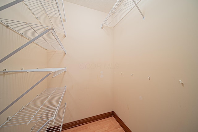 390 Engelwood Ct, Powell, OH 43065 - spacious closet featuring light wood-style flooring