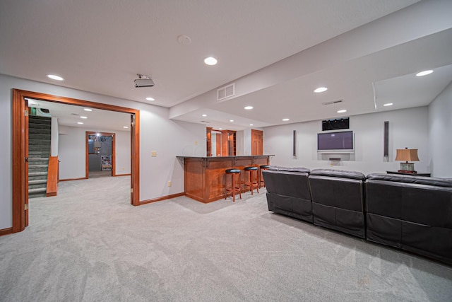 390 Engelwood Ct, Powell, OH 43065 - living room featuring bar with sink, carpet flooring, stairway, and recessed lighting