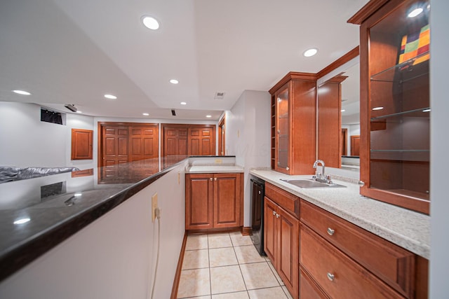 390 Engelwood Ct, Powell, OH 43065 - kitchen with recessed lighting, light tile patterned floors, dishwasher, light stone counters, and brown cabinets