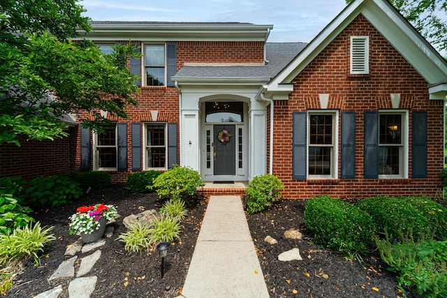 390 Engelwood Ct, Powell, OH 43065 - view of front facade featuring brick siding and a shingled roof