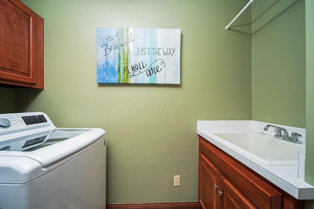 390 Engelwood Ct, Powell, OH 43065 - laundry room with washer / dryer and cabinet space