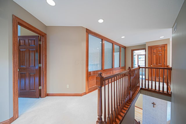 390 Engelwood Ct, Powell, OH 43065 - corridor with an upstairs landing, carpet floors, and recessed lighting