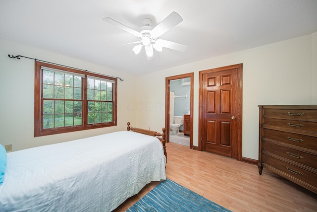 390 Engelwood Ct, Powell, OH 43065 - bedroom with light wood finished floors, ensuite bathroom, and a ceiling fan