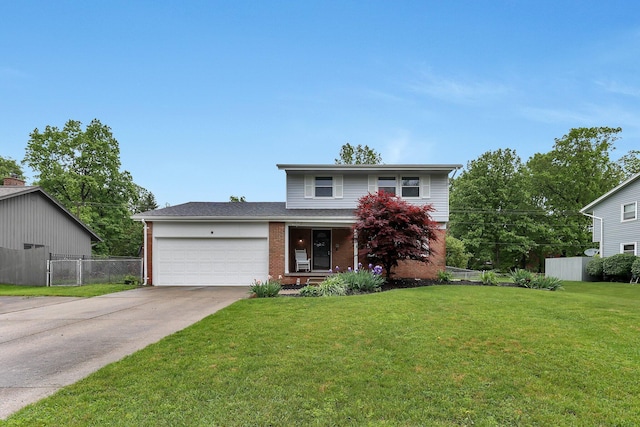 1200 Chanteloup Dr, Marion, OH 43302 - traditional-style house featuring a garage, brick siding, and driveway