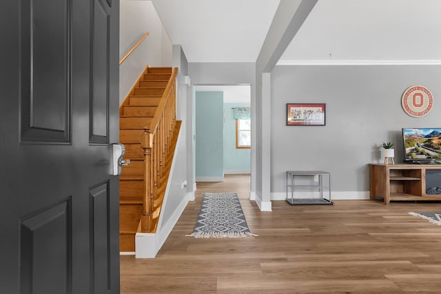 1200 Chanteloup Dr, Marion, OH 43302 - entryway featuring stairway, baseboards, and light wood-type flooring