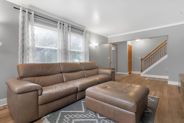 1200 Chanteloup Dr, Marion, OH 43302 - living area with light wood-style flooring, baseboards, stairs, and crown molding