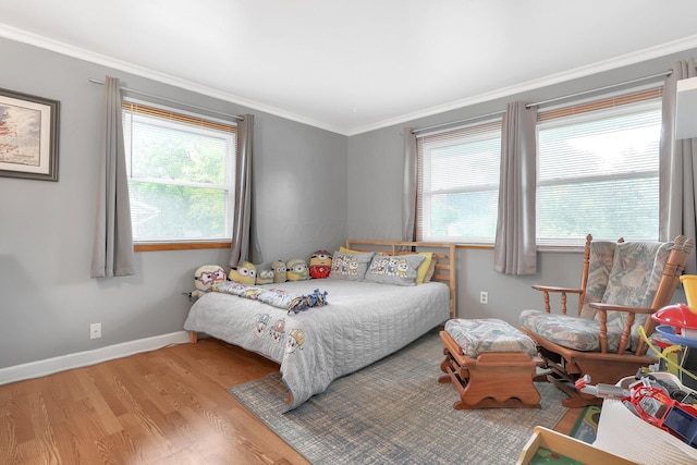 1200 Chanteloup Dr, Marion, OH 43302 - bedroom featuring wood finished floors, ornamental molding, and baseboards