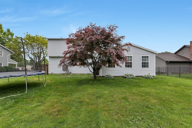 1200 Chanteloup Dr, Marion, OH 43302 - back of property with a trampoline