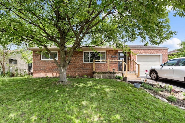 2690 Kingston Ave, Grove City, OH 43123 - single story home featuring brick siding, a garage, and a front yard