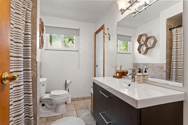 2690 Kingston Ave, Grove City, OH 43123 - bathroom with toilet, vanity, tile patterned flooring, and curtained shower