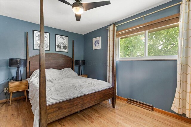 2690 Kingston Ave, Grove City, OH 43123 - bedroom featuring wood finished floors, baseboards, and a ceiling fan