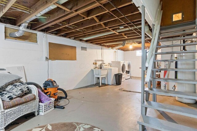 2690 Kingston Ave, Grove City, OH 43123 - unfinished below grade area featuring washing machine and clothes dryer