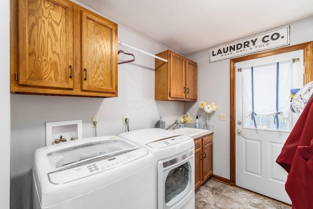1861 Ginder Rd NW, Lancaster, OH 43130 - laundry area with cabinet space, washer and dryer, and baseboards
