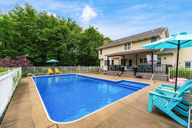1861 Ginder Rd NW, Lancaster, OH 43130 - view of swimming pool featuring a patio area and a wooden deck