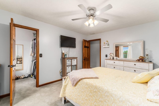 1861 Ginder Rd NW, Lancaster, OH 43130 - bedroom with light carpet, baseboards, and ceiling fan
