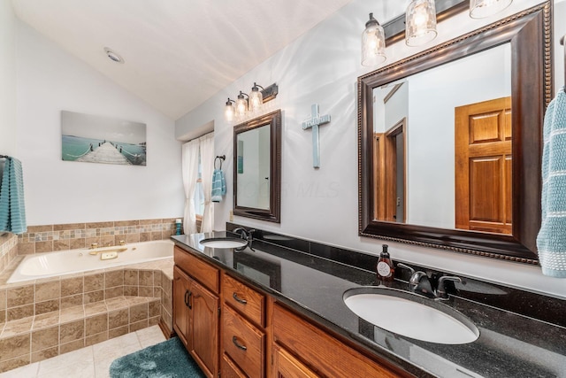 1861 Ginder Rd NW, Lancaster, OH 43130 - bathroom featuring a bath, lofted ceiling, tile patterned floors, and double vanity