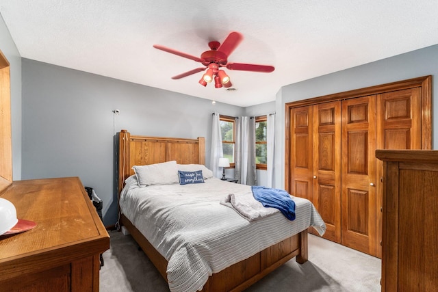 1861 Ginder Rd NW, Lancaster, OH 43130 - bedroom featuring light colored carpet, a closet, and ceiling fan