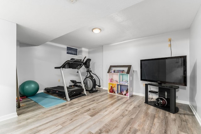 1861 Ginder Rd NW, Lancaster, OH 43130 - workout room with wood finished floors and baseboards