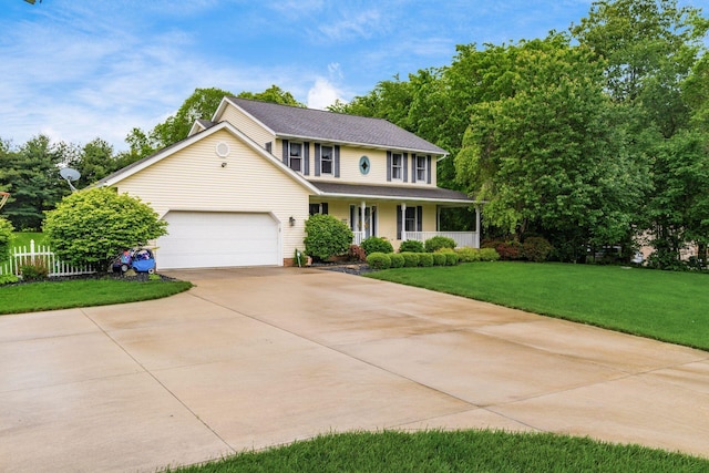 1861 Ginder Rd NW, Lancaster, OH 43130 - view of front of house featuring covered porch, concrete driveway, an attached garage, and roof with shingles