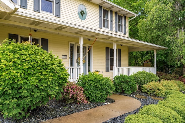 1861 Ginder Rd NW, Lancaster, OH 43130 - view of exterior entry featuring a porch