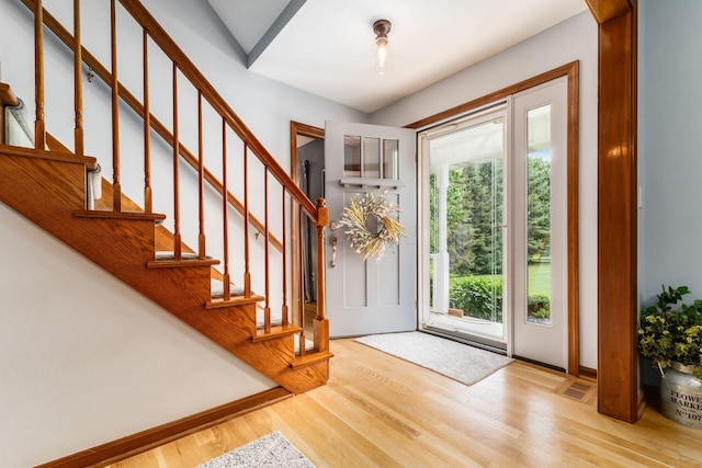 1861 Ginder Rd NW, Lancaster, OH 43130 - entrance foyer with wood finished floors, baseboards, and stairs
