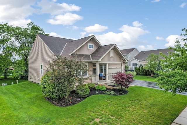 2079 Tournament Way, Grove City, OH 43123 - craftsman house featuring board and batten siding, a front yard, and roof with shingles