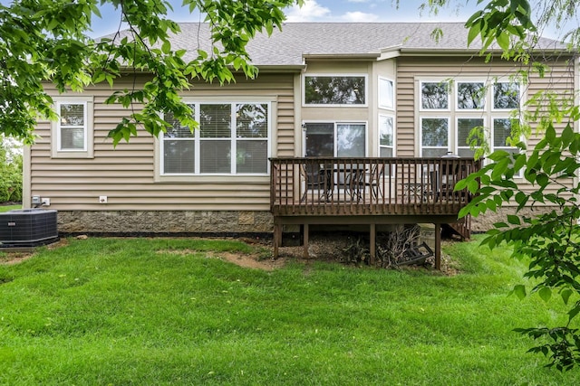 2079 Tournament Way, Grove City, OH 43123 - rear view of house with a deck, a yard, central air condition unit, and a shingled roof