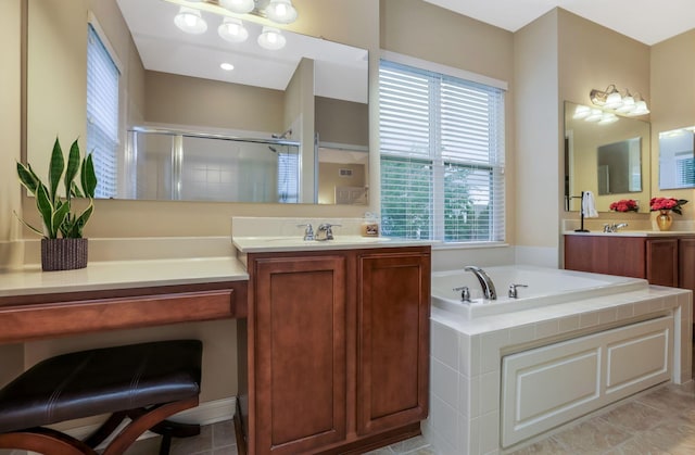 2079 Tournament Way, Grove City, OH 43123 - bathroom featuring a shower stall, two vanities, and a garden tub