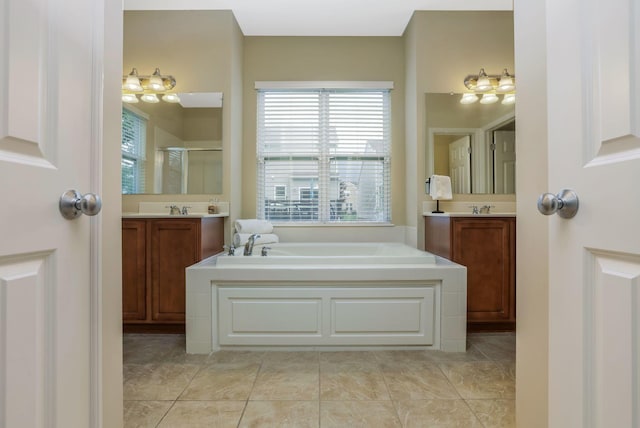 2079 Tournament Way, Grove City, OH 43123 - full bath with a stall shower, a bath, and two vanities