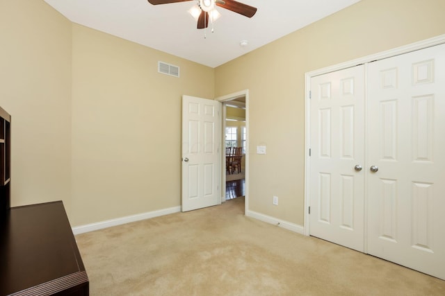2079 Tournament Way, Grove City, OH 43123 - unfurnished bedroom with light carpet, baseboards, a closet, and ceiling fan