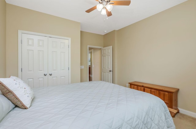 2079 Tournament Way, Grove City, OH 43123 - bedroom featuring light carpet, a closet, a ceiling fan, and baseboards