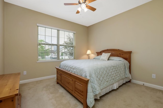 2079 Tournament Way, Grove City, OH 43123 - bedroom featuring light colored carpet, baseboards, and a ceiling fan