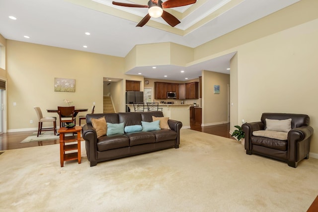 2079 Tournament Way, Grove City, OH 43123 - living room with stairway, recessed lighting, ceiling fan, baseboards, and a high ceiling