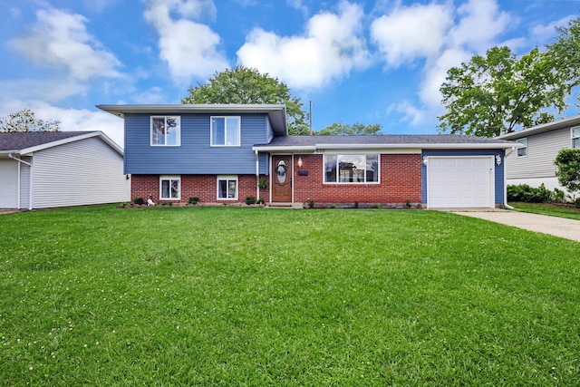600 Kappler Rd, Heath, OH 43056 - tri-level home with an attached garage, driveway, a front yard, and brick siding