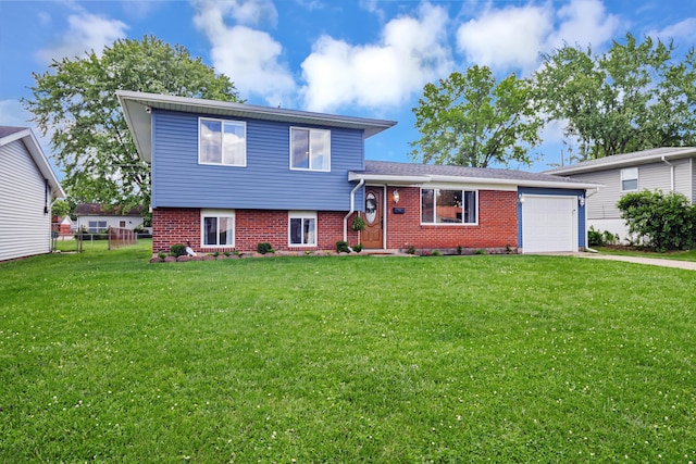 600 Kappler Rd, Heath, OH 43056 - tri-level home featuring a garage, driveway, and brick siding