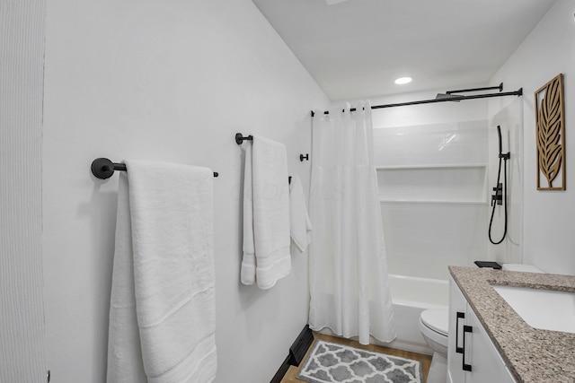 600 Kappler Rd, Heath, OH 43056 - full bathroom featuring vanity, shower / tub combo with curtain, toilet, wood finished floors, and recessed lighting